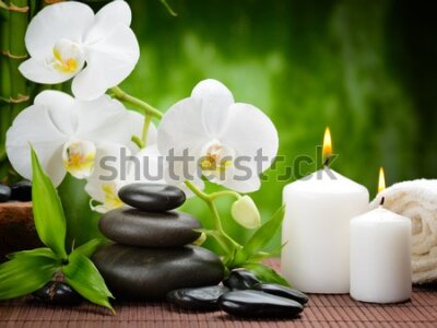 Fototapeta Białe orchidee kamienie i świeczki