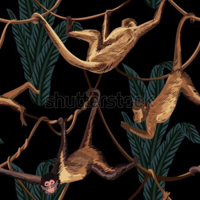 Fototapeta Małpki na linach wśród liści