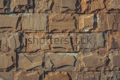 Fototapeta Ozdobny mur z kamiennych cegieł